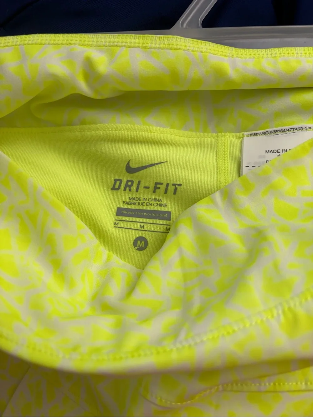 Nike. Neon skort with pleats.  Medium